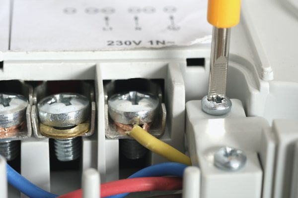 Pofessional wiring and installation hob in the kitchen